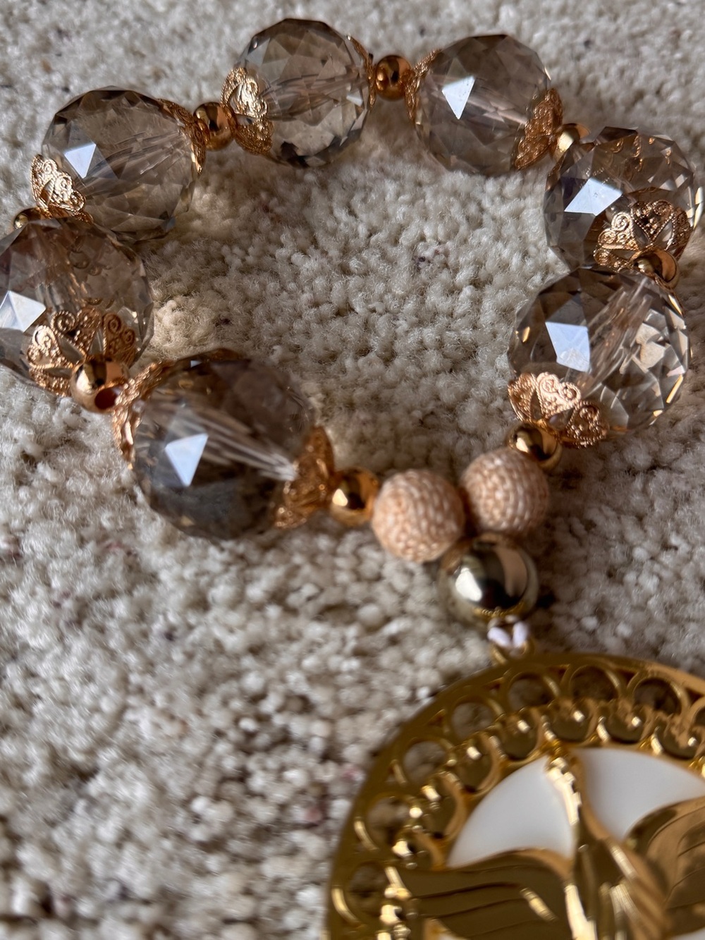 Smoky Crystal and Gold Stretch Bracelet with Gold Medallion